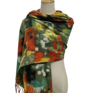 Patchwork sjaal van zachte wol met kwastjes